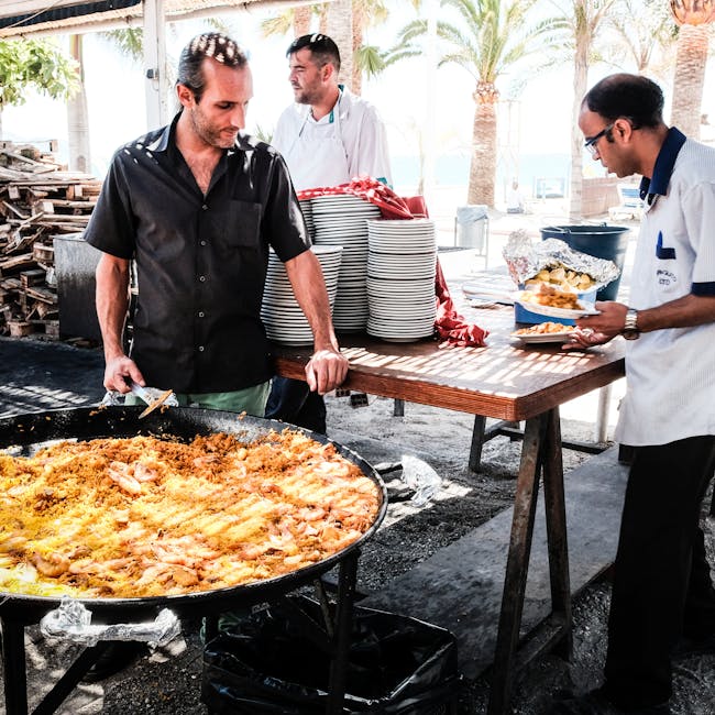 Terrazza di La Riua con paella tradizionale