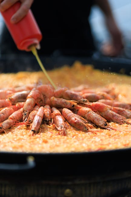 Paella valenciana senza glutine con vista mare