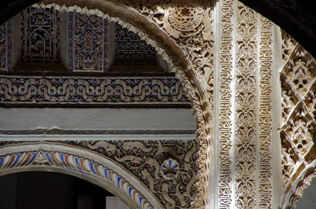 Close-up of carved stucco details inside the Nasrid palaces