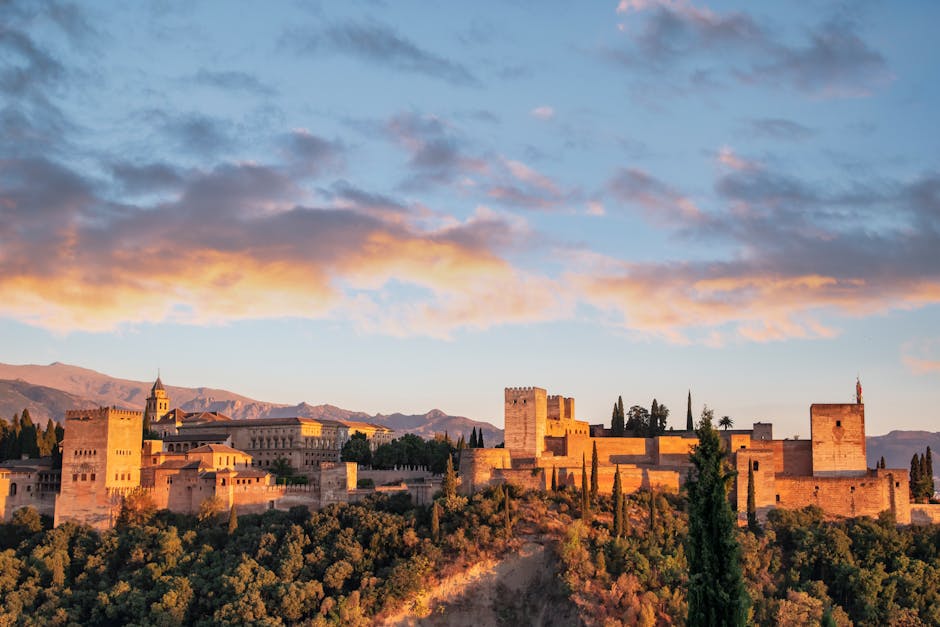 Panoramic sunrise view of the Alhambra from Sabika Hill, Granada