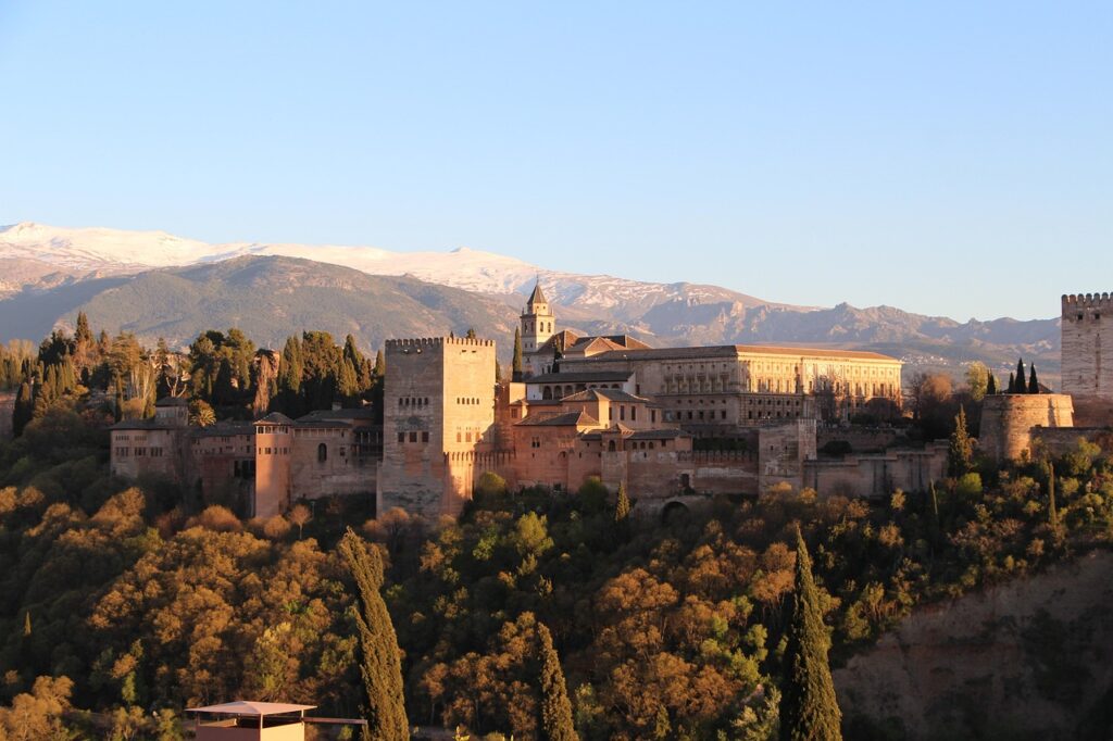 Sunset view of the Alhambra and Granada city lights