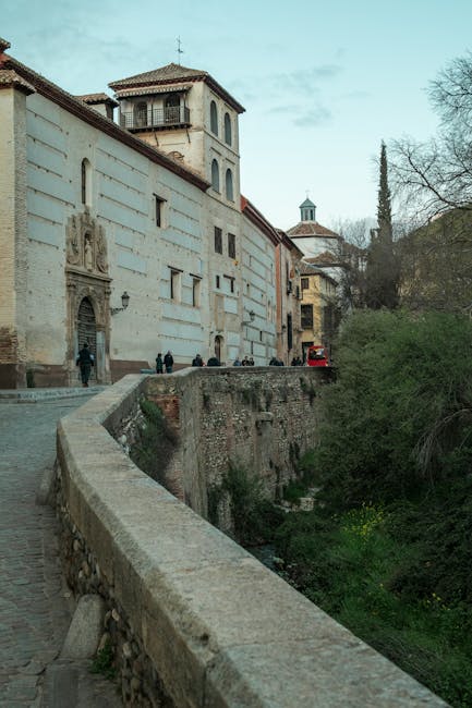 Carrera del Darro riverside street with historic buildings