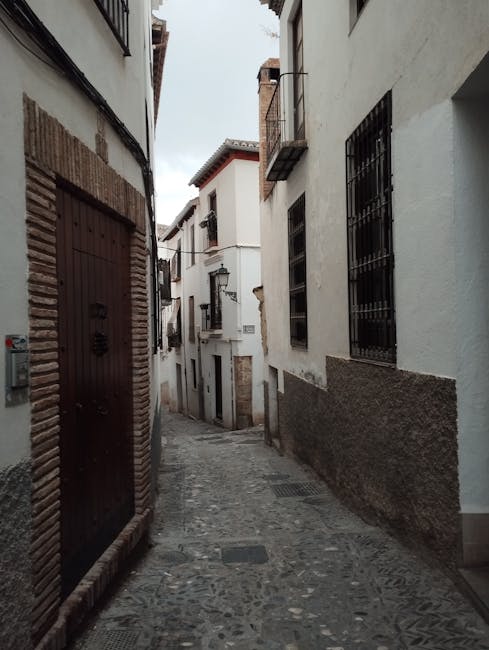 Granada streets in the evening with lanterns and stone paving