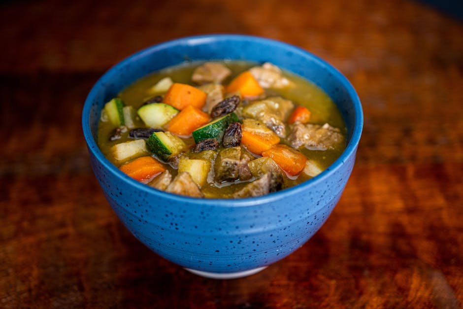 rustic vegetarian stew bowl in a cozy dinner scene