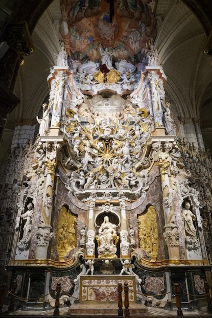 Interior of Toledo Cathedral with golden altar and choir stalls