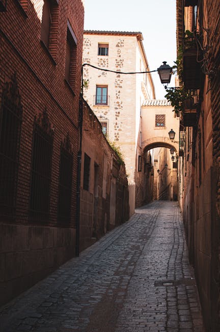 Narrow cobblestone street in Toledo's old town