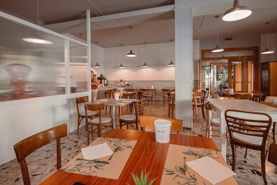 Quiet Porto café interior with wooden tables, chairs, and takeaway cup