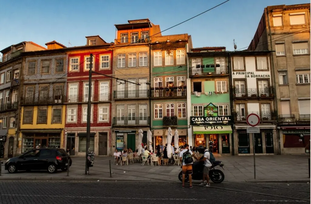 Historic square with morning cafes and people