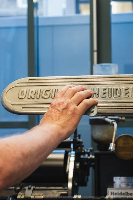Hands-on demonstration with an antique printing press at the museum