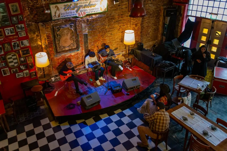 Intimate Porto bar stage with three musicians playing before small audience