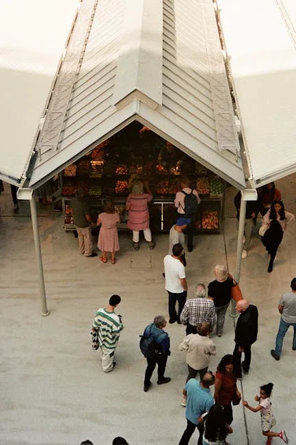 Overhead view of a busy Porto market stall under canopy