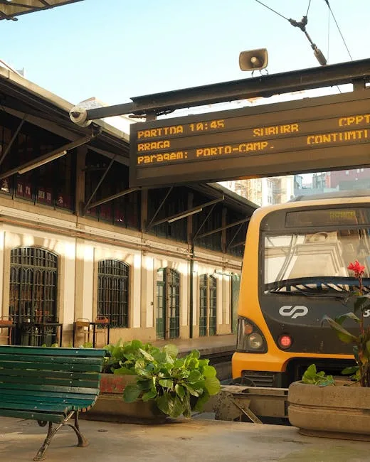 Regional CP train at Porto station platform under departure display board