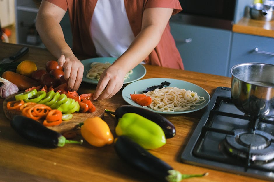 Apartment kitchenette preparing a healthy meal with fresh vegetables