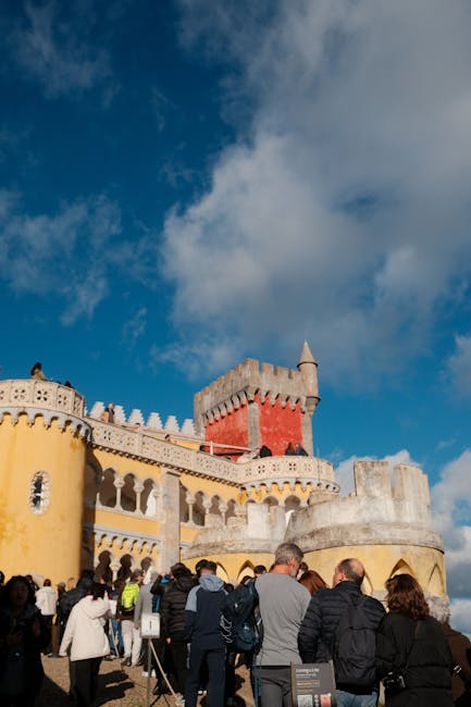 Crowd in front of the colorful Pena Palace facade