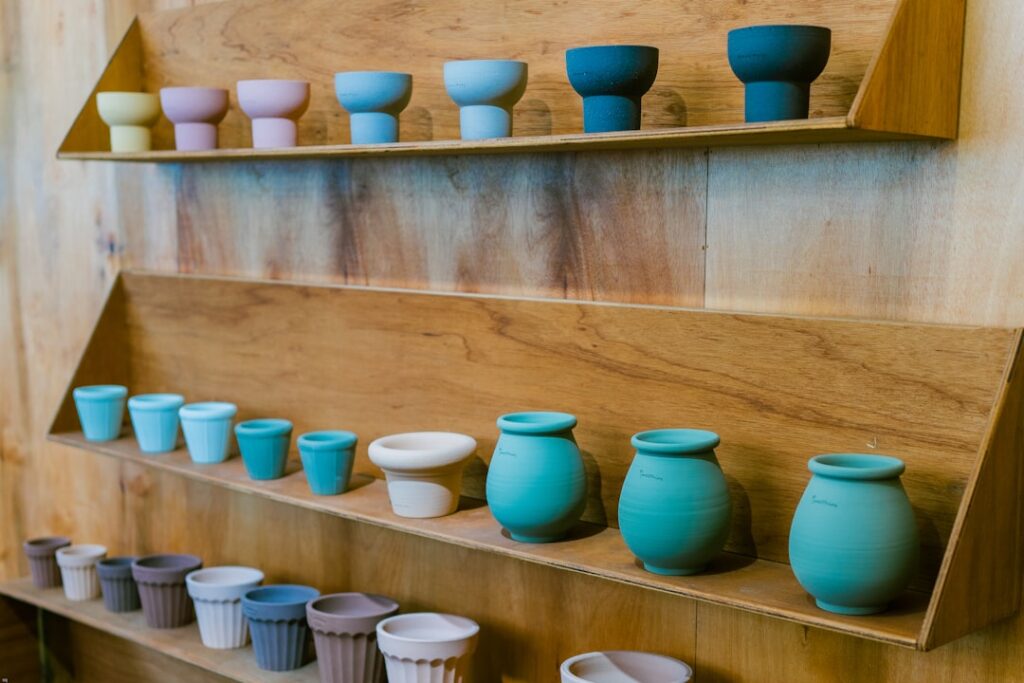 Artisan ceramic shop display with handmade pottery in Coimbra