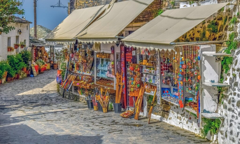 Colourful market stalls selling local souvenirs in Coimbra