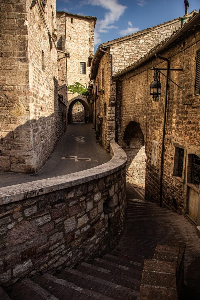 Misty morning in a narrow old street of Coimbra