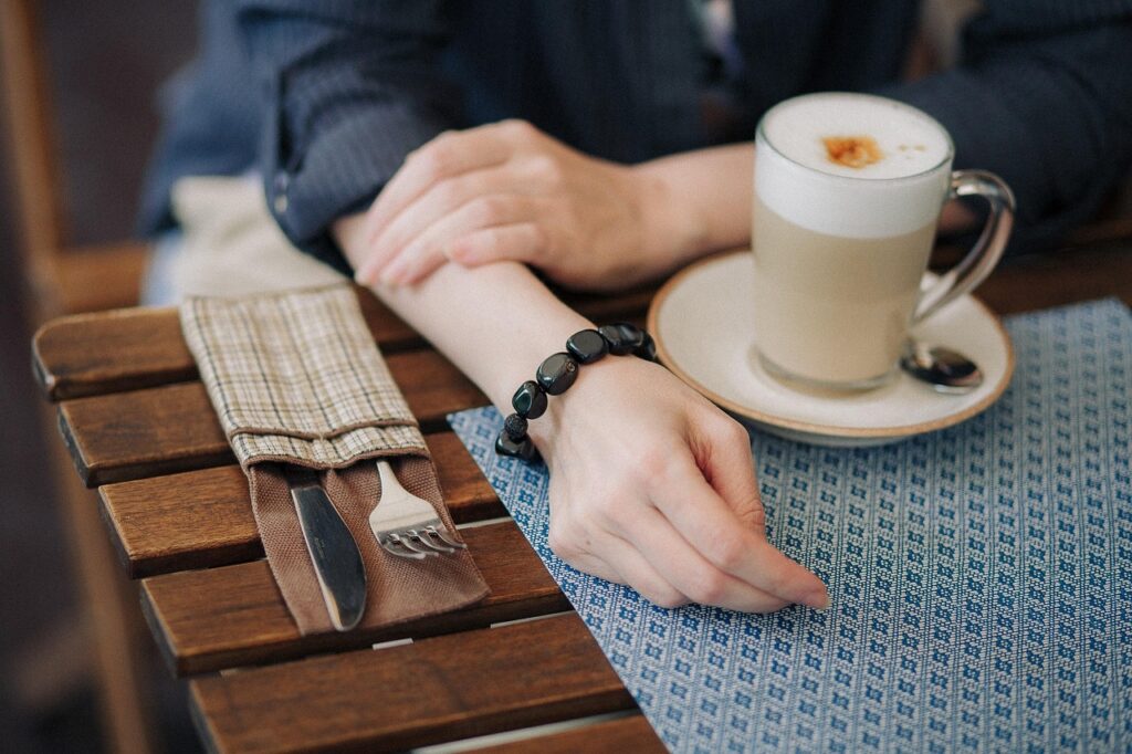Local café scene with Portuguese pastry and espresso on a table