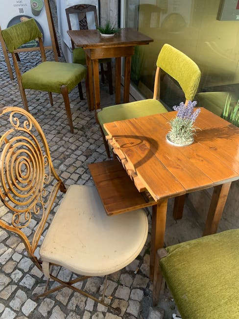 Riverfront cafe outdoor seating at Jardim Café, Mondego
