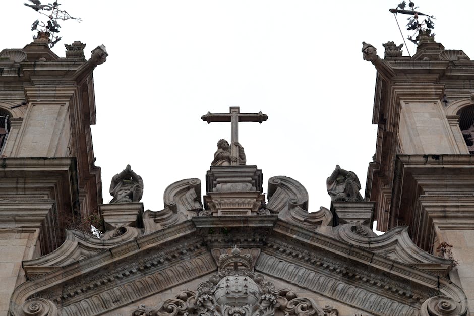 Exterior stone façade of the historic Sé Velha de Coimbra church