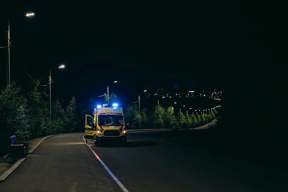 Ambulance arriving at hospital entrance in Krakow at night