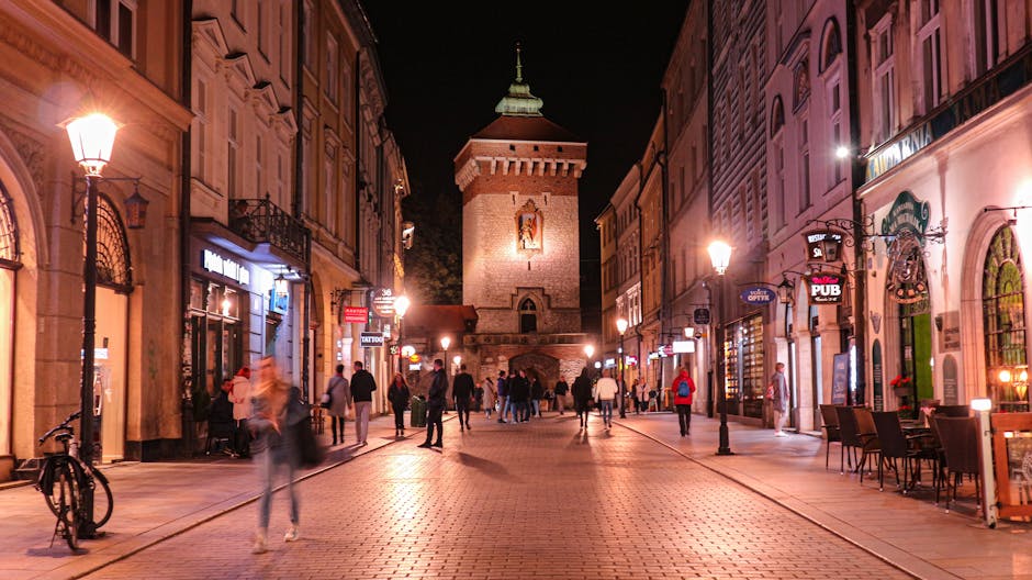 Florian Street pharmacy entrance at night in Krakow