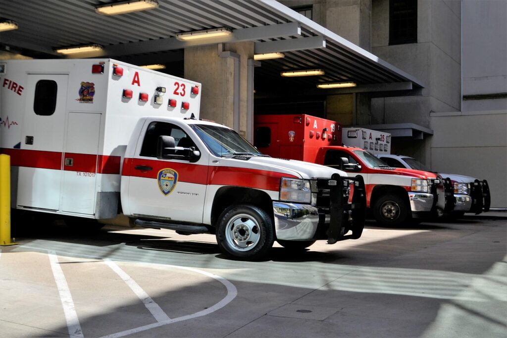 Ambulance arriving at a hospital emergency department in Krakow at night