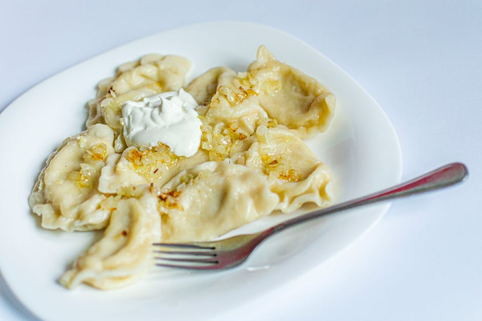 Close-up of a plate of pierogi street food in Kraków