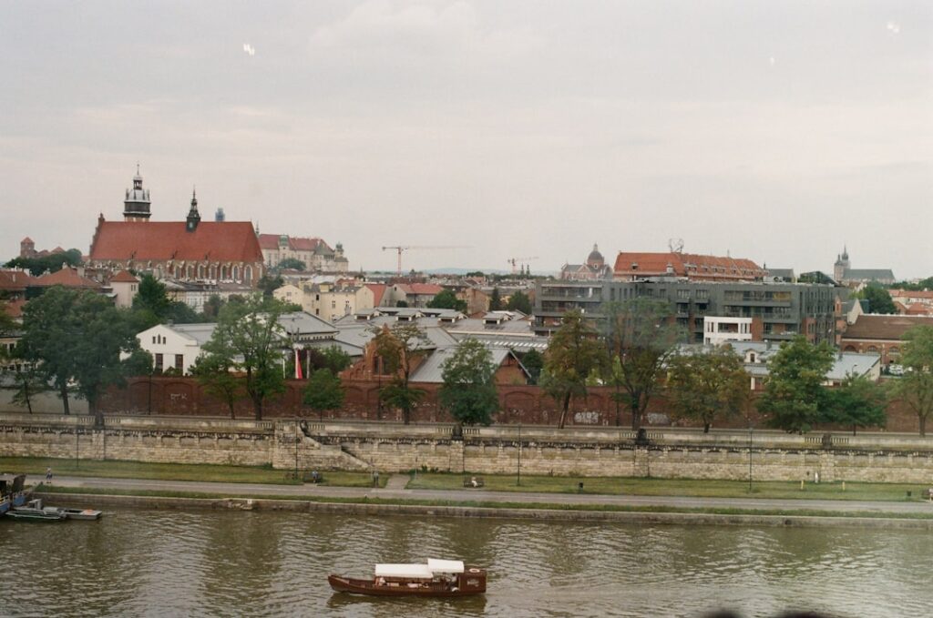 Wawel Castle and the dragon statue by the Vistula River