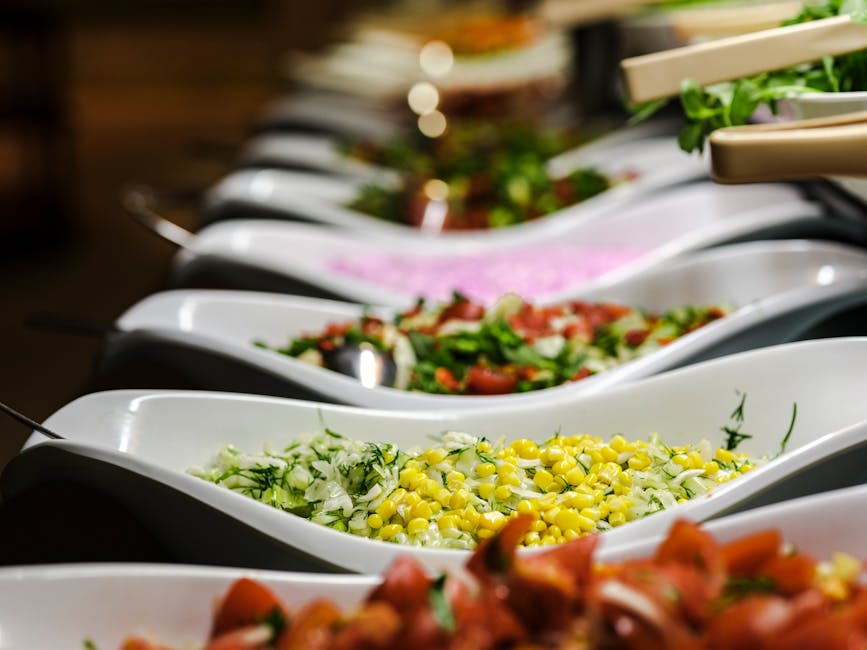 Indoor food market with a vegan buffet and colorful salads at Mirowska Market