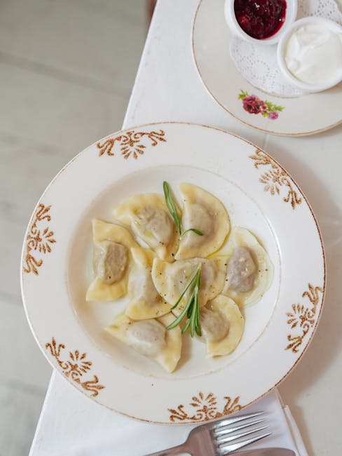 Polish pierogi dish served in cozy restaurant setting with wooden table