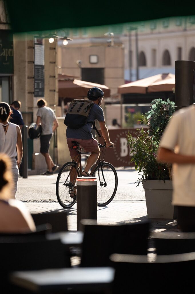 Quiet Żoliborz street with pedestrians in the late afternoon