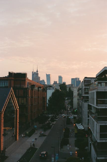 Sunset over Warsaw skyline with restaurant terrace atmosphere