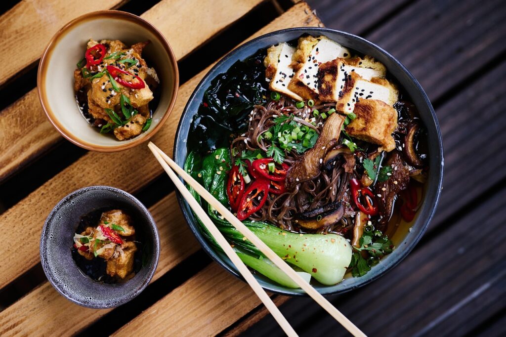 Vegan ramen bowl with tofu, shiitake and greens