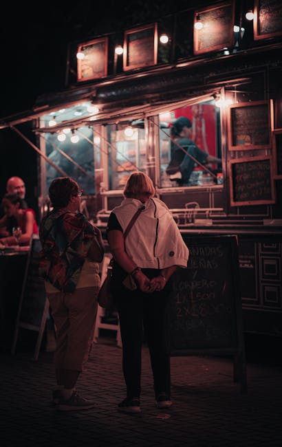 Night market with food trucks on Grzybowska Street