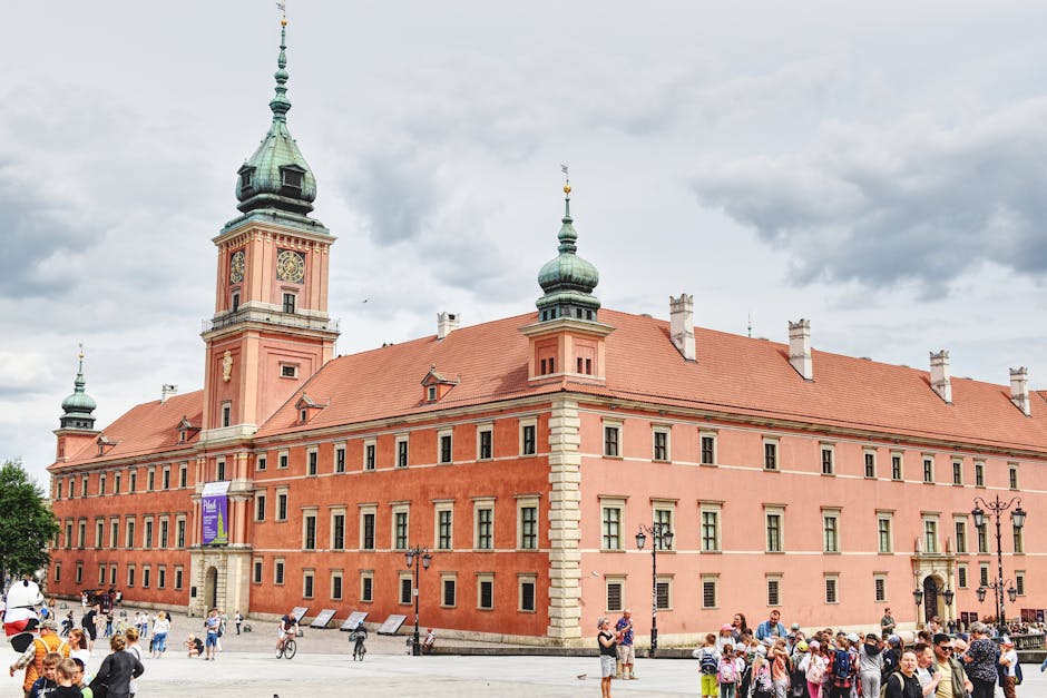 Guided tour group inside the Royal Castle