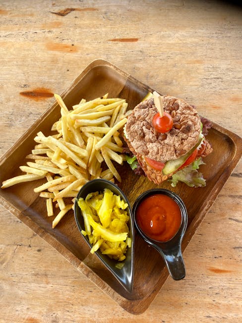 Vegan burger with pickles and fries at Krowarzywa Hoza 40