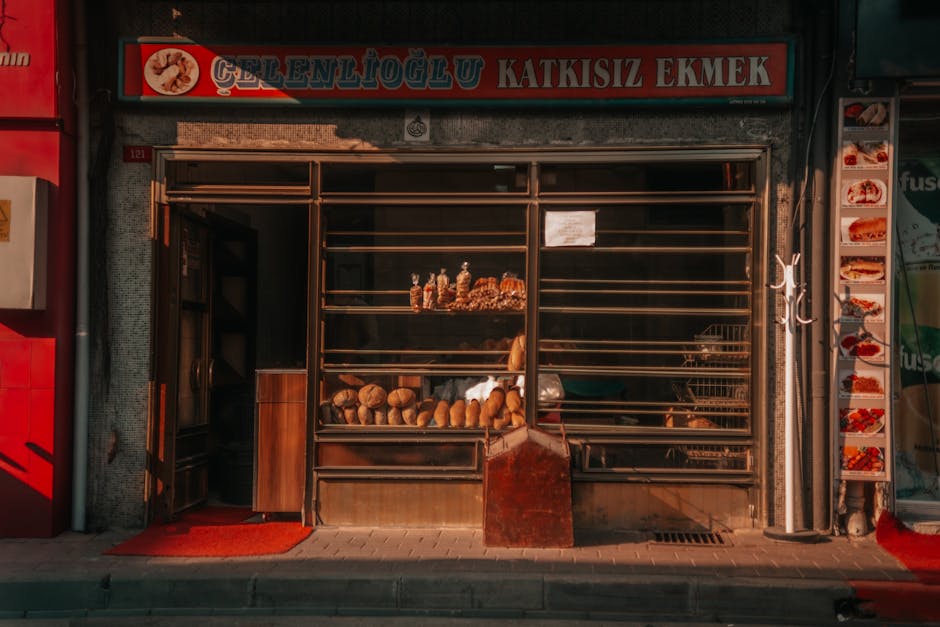 Small local bakery storefront near Plac Wilsona with breakfast pastries