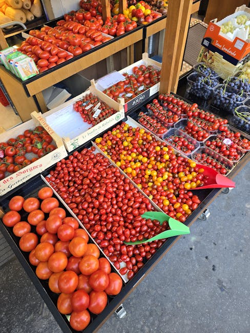 Marktkramen met verse producten in Carouge