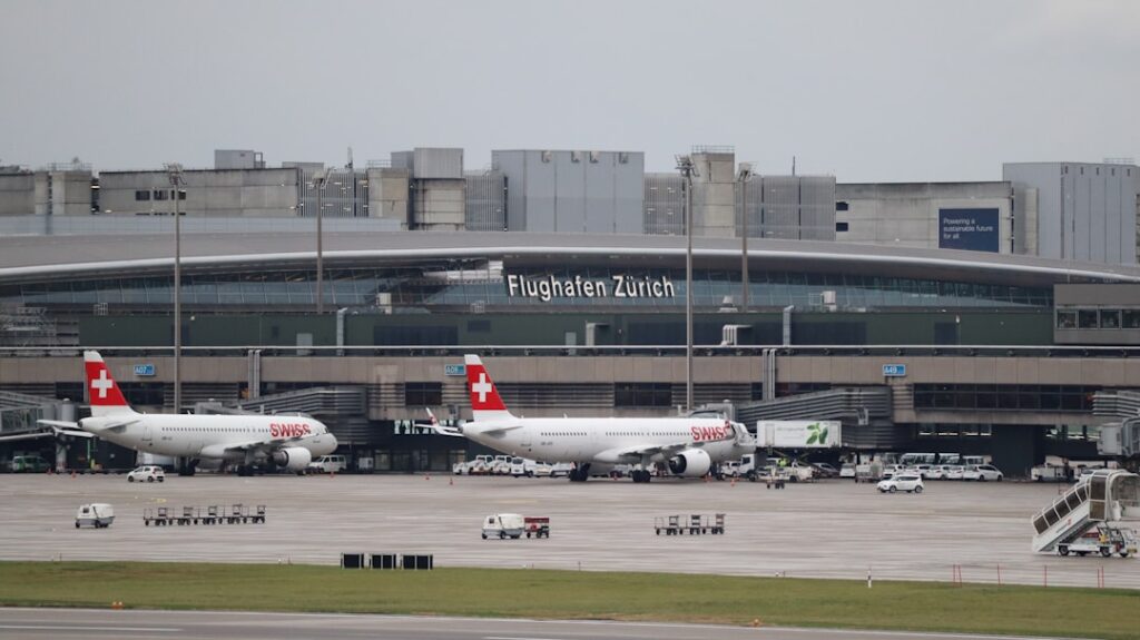 Zurich Airport terminal interior with arrivals area