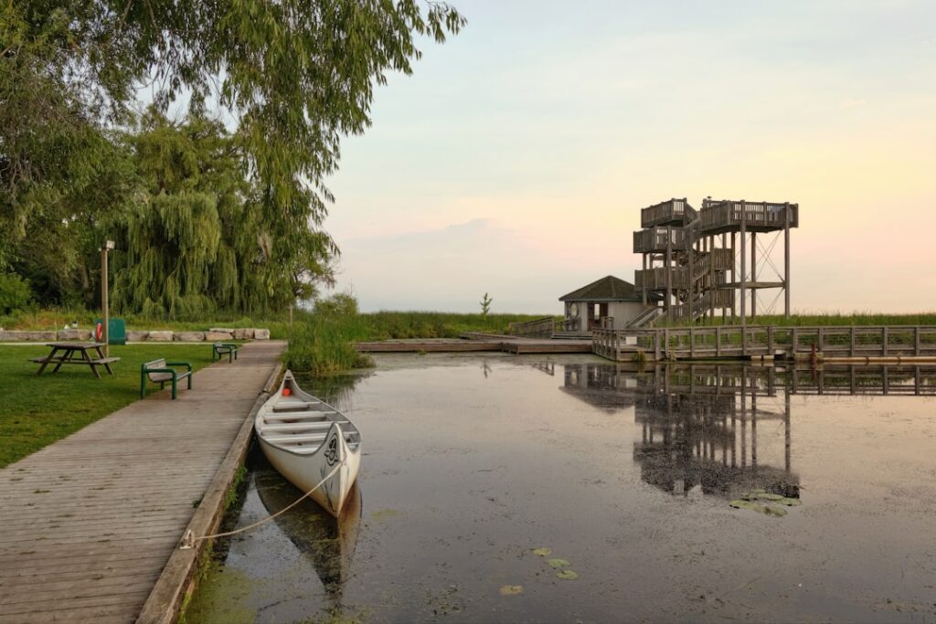 Chapel Bridge and Water Tower from the lakeside with tourists