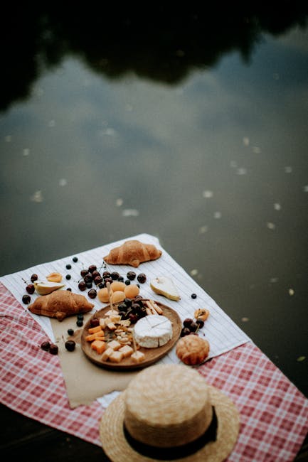 Lakeside picnic with bread, plant-based cheese and fruit in Lucerne