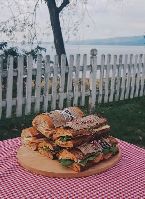 Picnic by Lake Lucerne with gluten-free bread on a wooden board