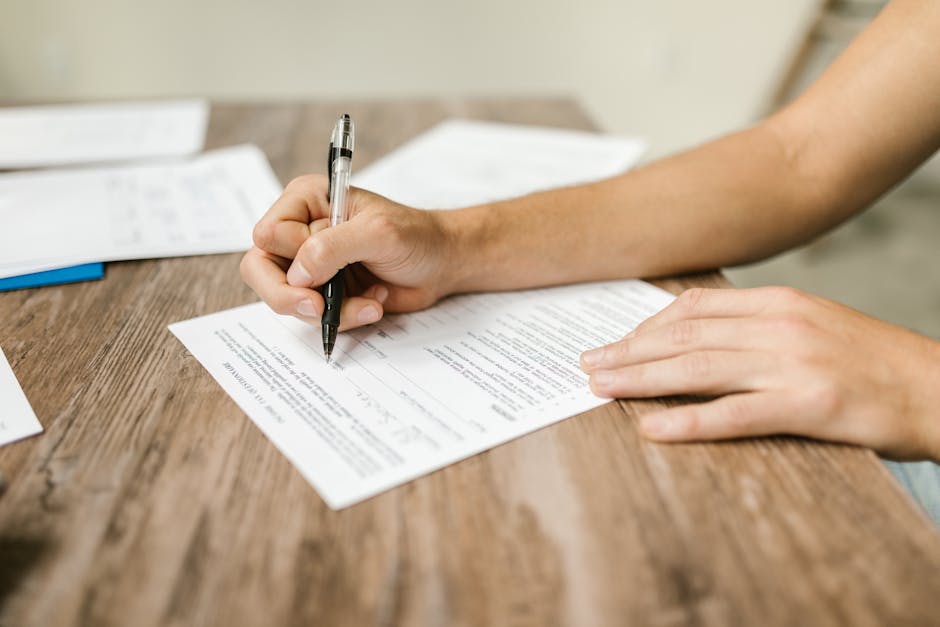 Customs declaration form being filled out at a desk with receipts